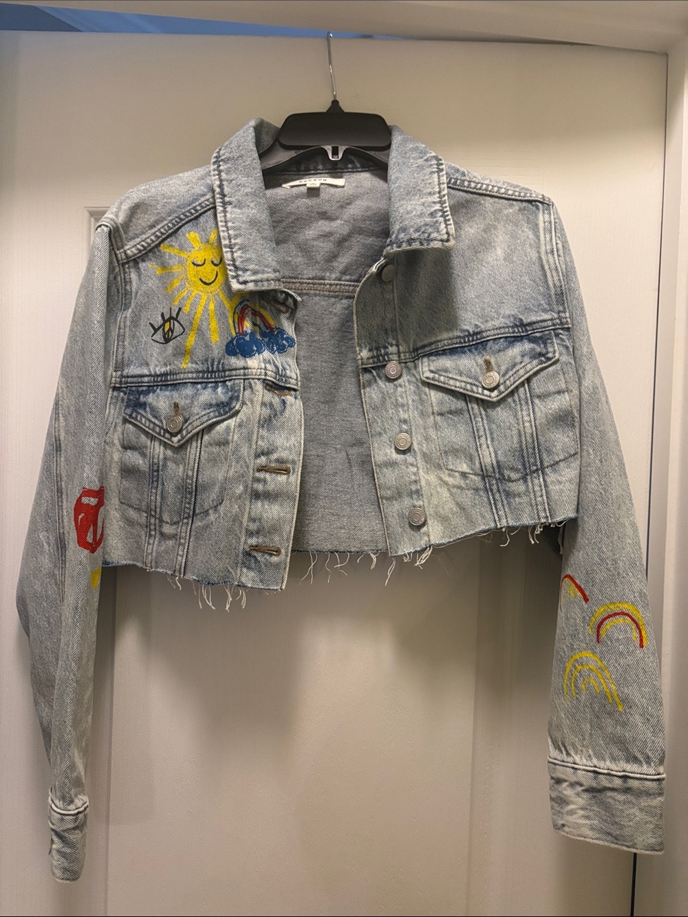 PacSun Light Wash Cropped Denim Jacket with Hand-Painted Sun and Rainbows